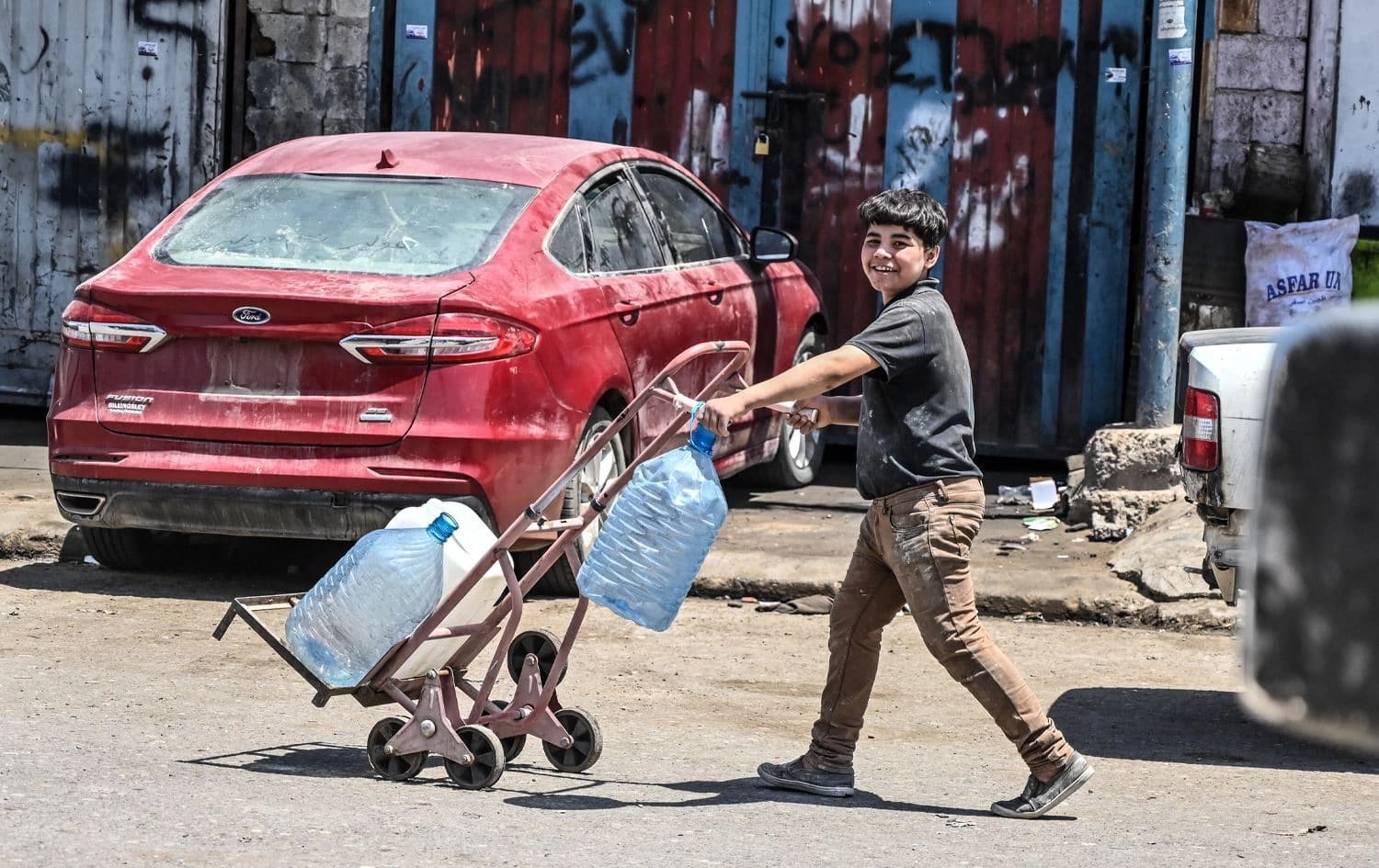 منداڵێک لە ناوچەی پیشەسازیی باشووری هەولێر کاردەکات. وێنە: بڵند تاهیر - رووداو