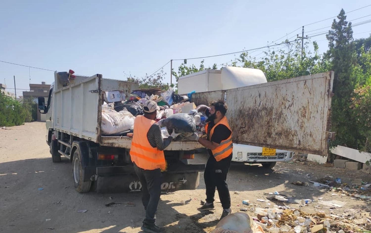 Municipality workers collecting animal carcasses in Erbil. Photo: KRG