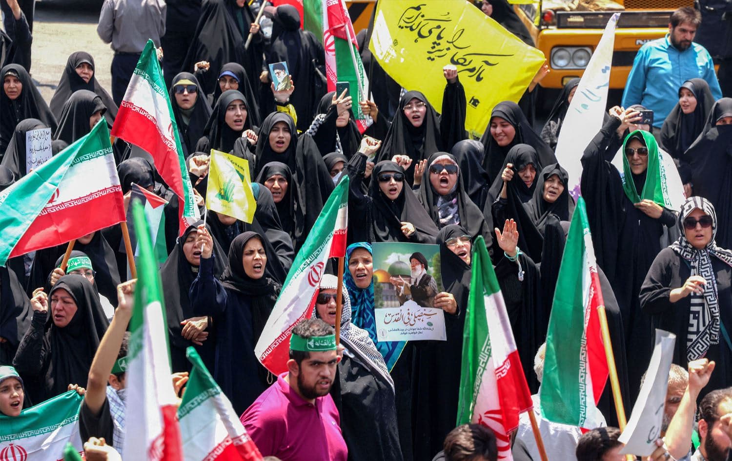 People protesting against Israel's strikes on Iran in central Tehran on June 13, 2025. Photo: Atta Kenare/AFP
