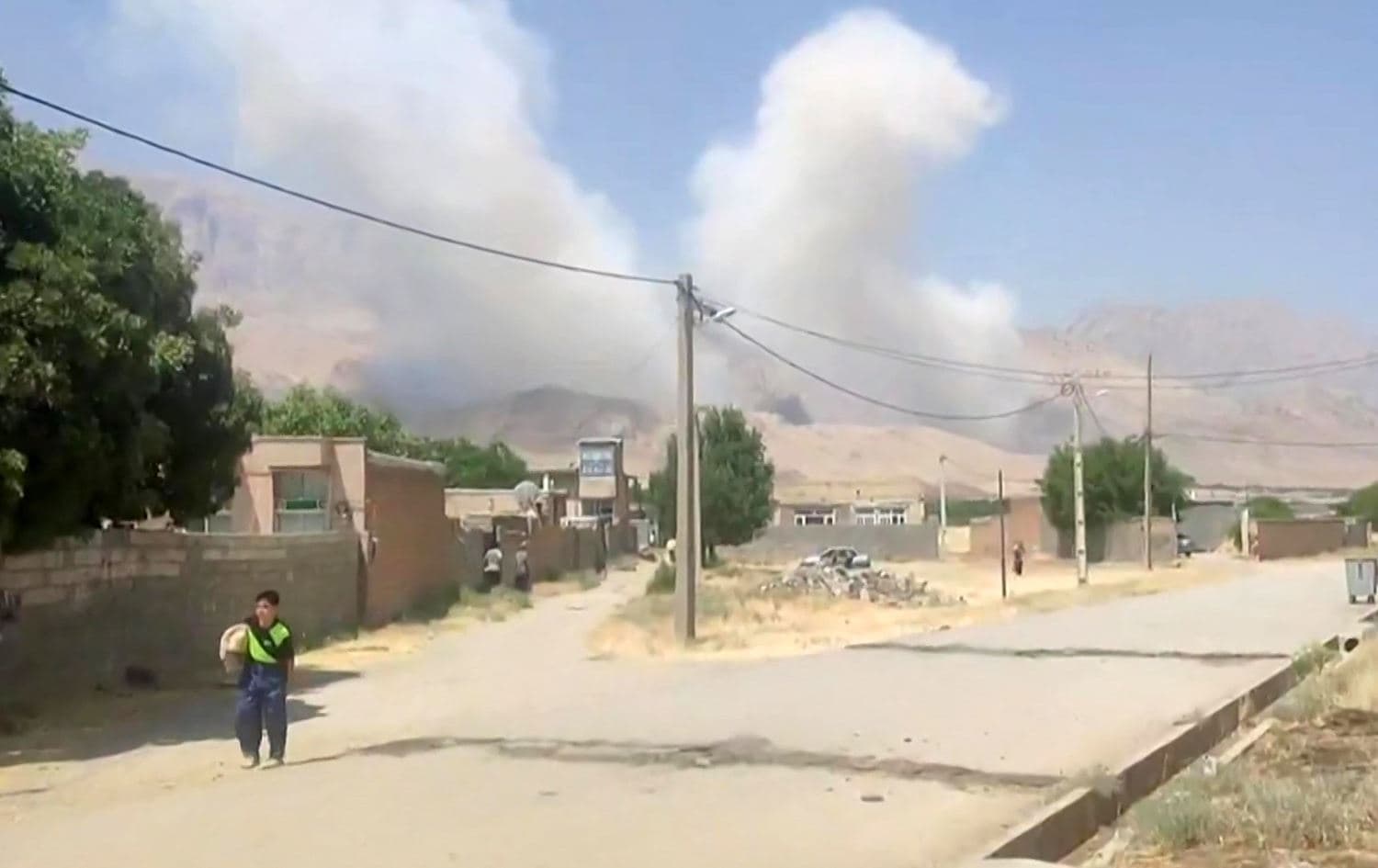Smoke rises following an Israeli strike in western Iran’s (Rojhelat) Kermanshah province on June 13, 2025. Photo: UGC/AFP