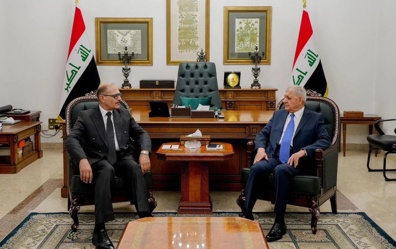 Iraqi President Abdul Latif Rashid (right) and Federal Supreme Court head Jassim al-Umairi (left) meet in Baghdad on June 15, 2025. Photo: Iraqi Presidency