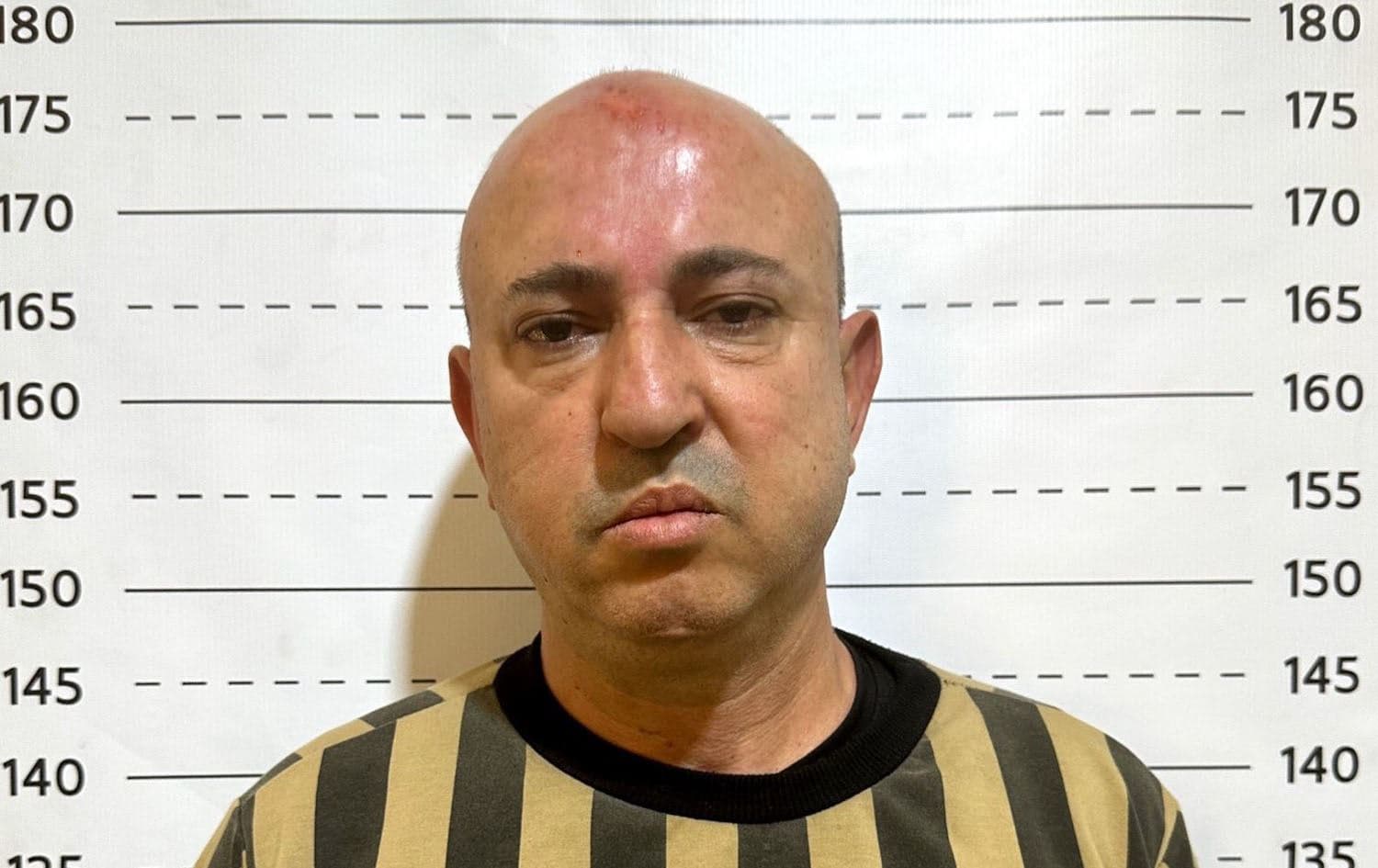 Mugshot of Wassim al-Assad. Photo: Syrian interior ministry