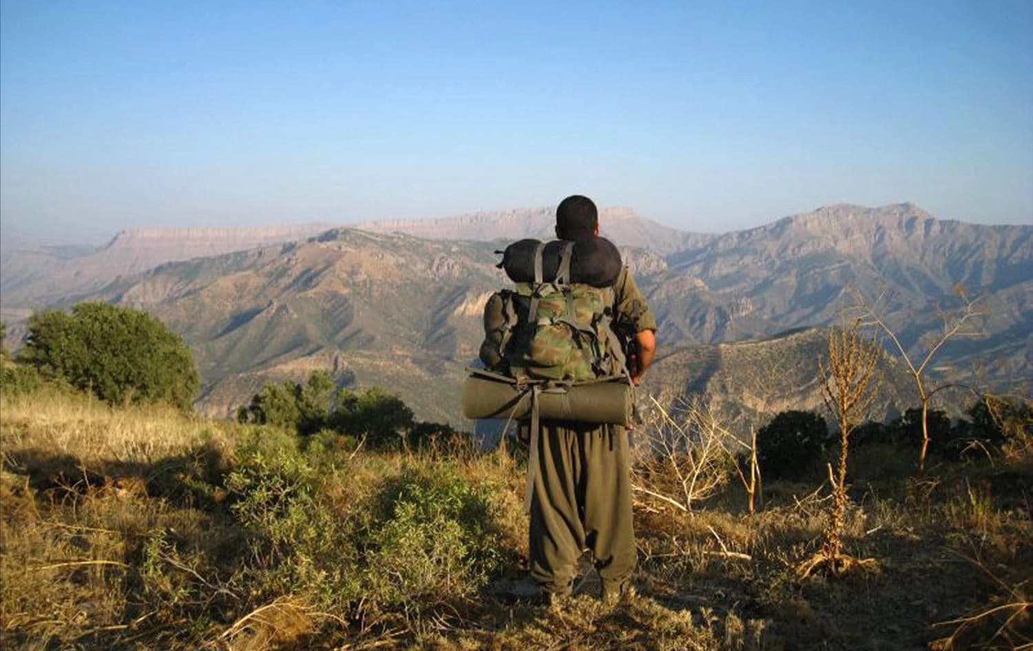 گەریلایەکی پەکەکە لە چیاکانی کوردستان. وێنە: AFP