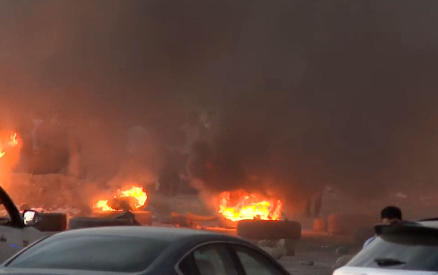 Loyalists of tribal figure burn tires in western Erbil on July 8, 2025. Photo: Screengrab/Rudaw