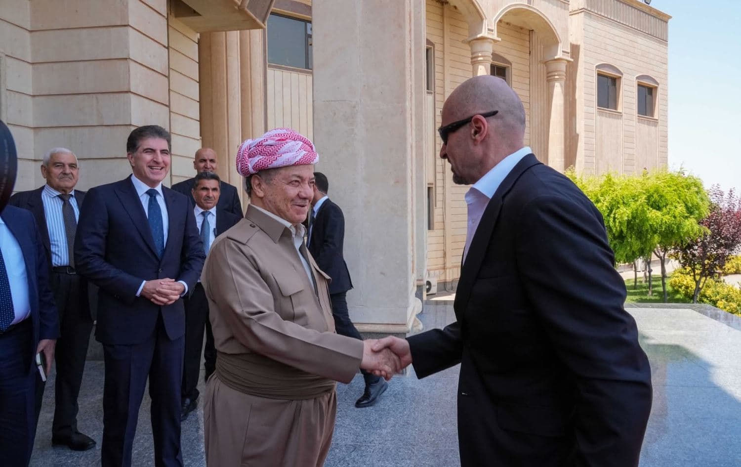 Kurdistan Democratic Party (KDP) Masoud Barzani (left) and Patriotic Union of Kurdistan (PUK) leader Bafel Talabani (right), with deputy KDP leader and Kurdistan Region President Nechirvan Barzani in the background, ahead of a meeting in Erbil's Pirmam district on July 14, 2025. Photo: handout/KDP