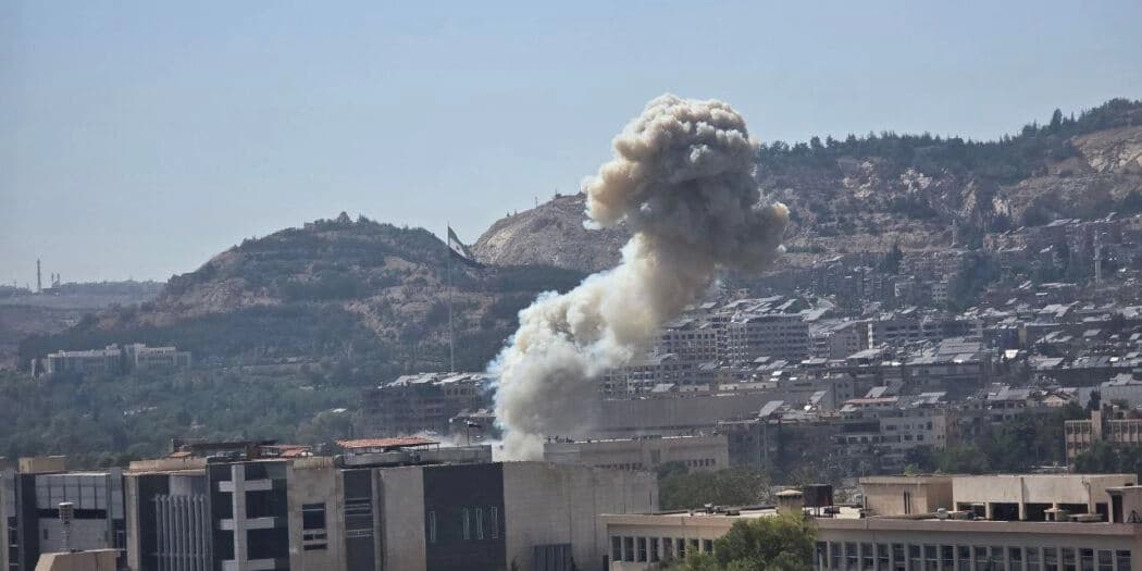 Israel strikes entrance gate of Syrian military building in Damascus on July 16, 2025. Photo: SANA