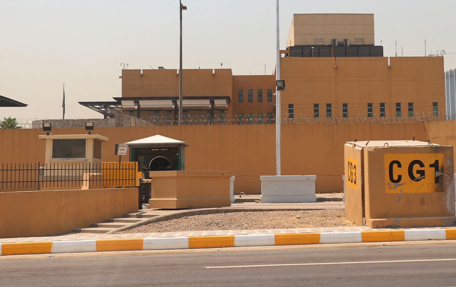 An empty road in front of an entrance to the US Embassy in Baghdad’s Green Zone on June 12, 2025. Photo: Ahmad al-Rubaye/AFP