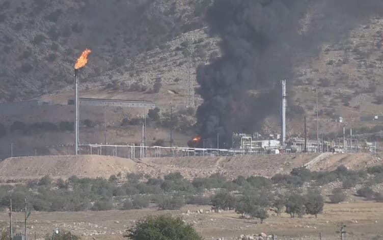 Black smoke billows from a fire sparked by a drone attack on the DNO oil field in Peshabur, located in the Kurdistan Region’s northern Duhok province, on July 16, 2025. Photo: Screengrab/Rudaw