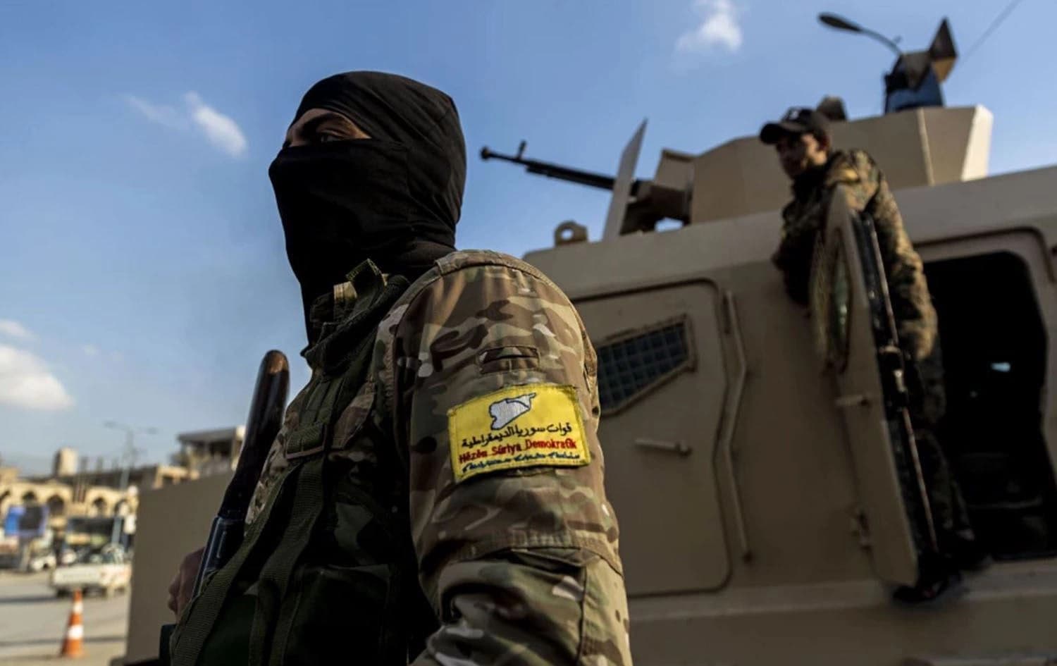 Syrian Democratic Forces (SDF) fighters stand guard at Al Naeem Square, in Raqqa, Syria on February 7, 2022. File photo: AP