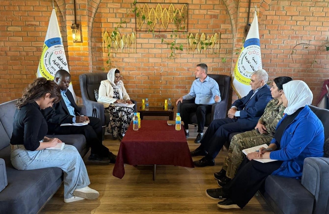 Nasriya Mohammed Nasser, commissioner at the Tanzanian embassy in Cairo received by Robel Bahou, deputy of the foreign relations department at the the Kurdish-led Democratic Autonomous Administration of North and East Syria (DAANES) in Rojava on August, 11, 2025. Photo: Kar_derve/X