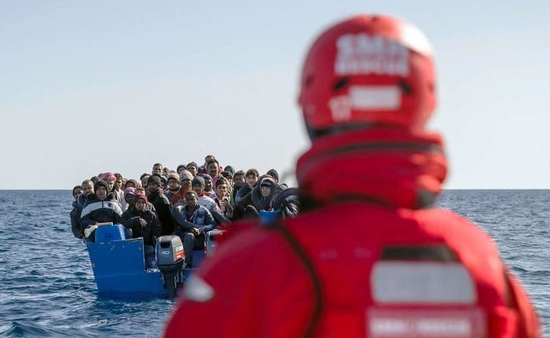 A number of illegal migrants being taken to a Spanish rescue boat in the Mediterranean international waters off the Libyan coast. AFP file photo
