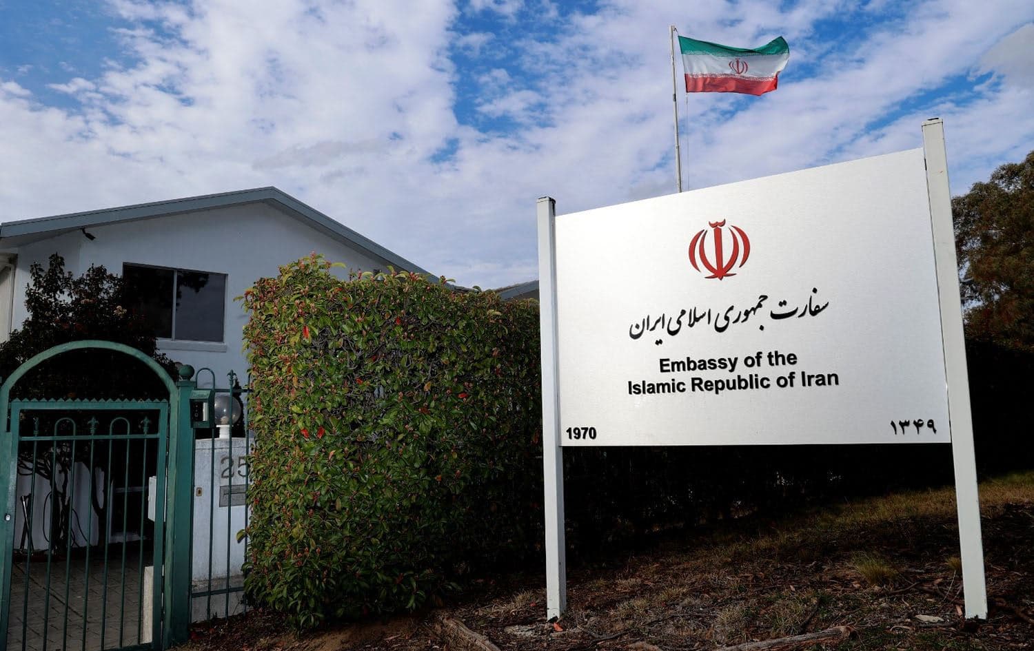The Iranian national flag flies over the Iranian embassy in Canberra on August 26, 2025. Photo: AFP