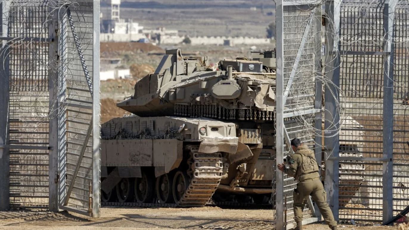 Battle tank crosses into the buffer zone separating Israeli and Syrian forces in the Golan Heights on 2 March 2025. Photo: AFP