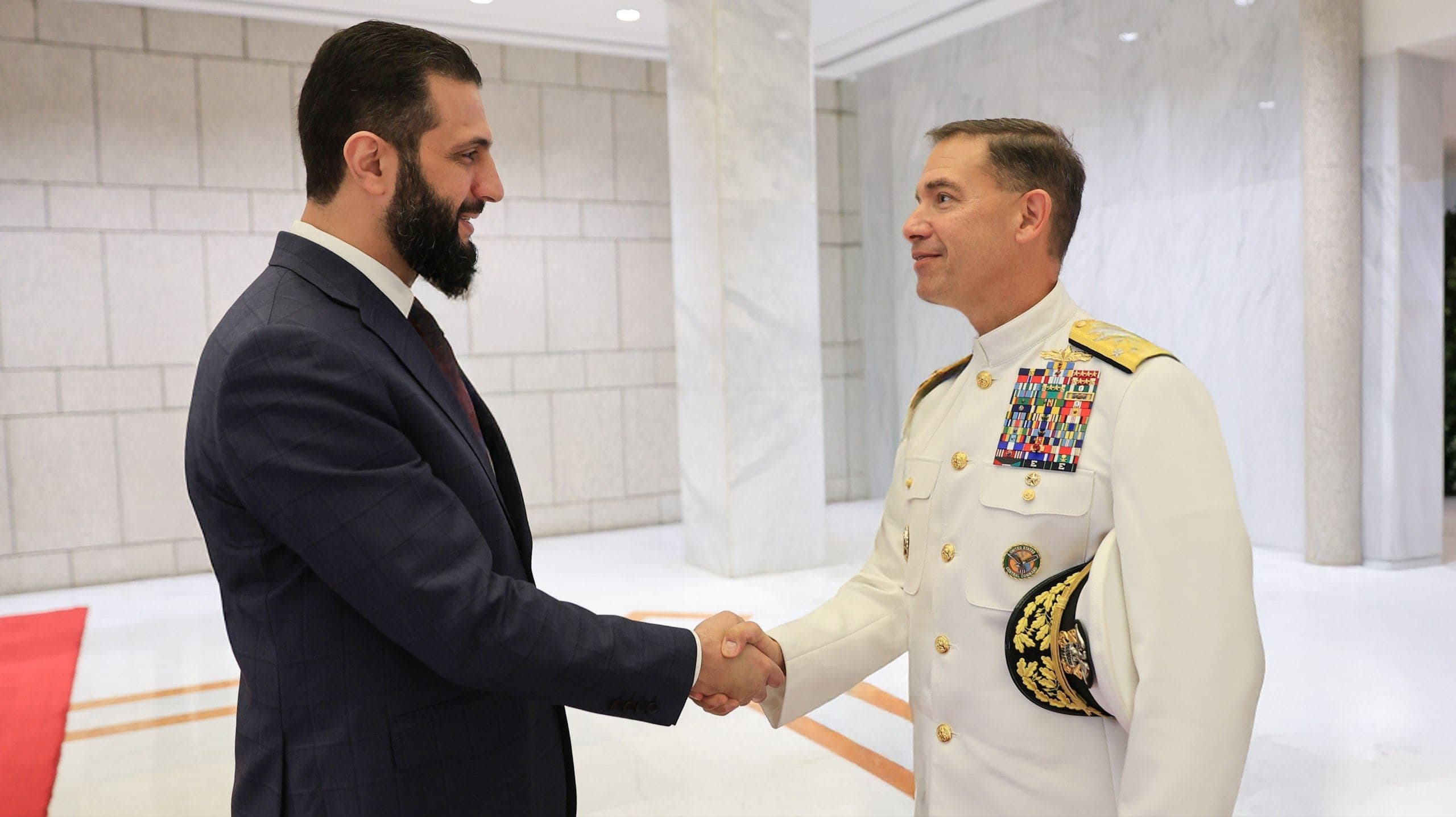 Syrian interim President Ahmed al-Sharaa (left) received Admiral Brad Cooper, commander of United States troops in the Middle East, (right) in Damascus on September 12, 2025. Photo: Syrian presidency 