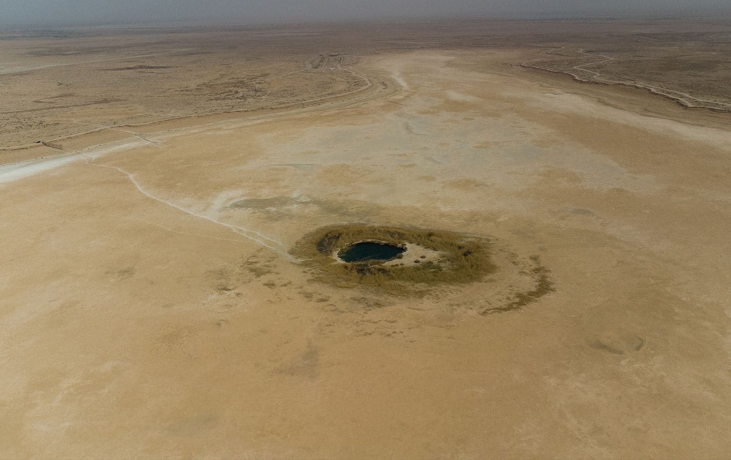 An aerial view of a pond remaining at the dried-up Sawa Lake in Iraq's southern province of al-Muthanna. File photo: Bilind T. Abdullah/Rudaw