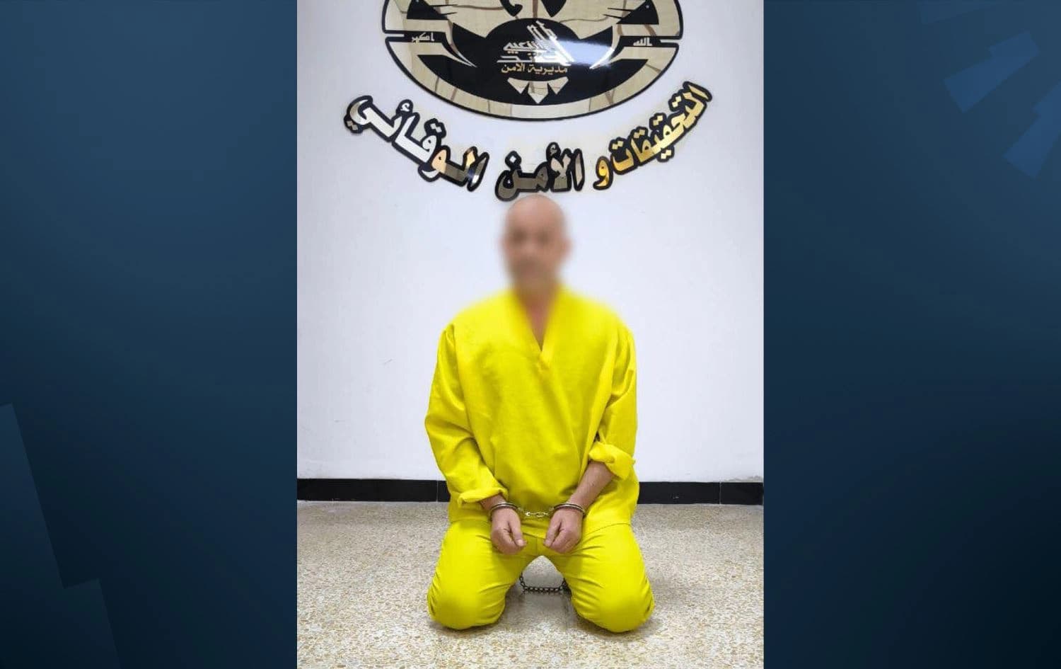 ئەو کەسەی بە دڕاندندنی وێنەی "سەرکردەی قیادە" تۆمەتبار کراوە.