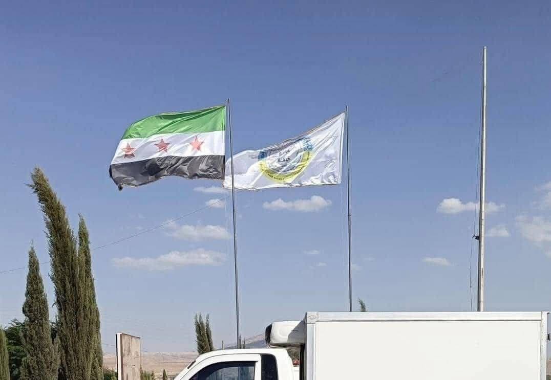 Kurdish-led authorities on Sunday raised the flag of Syria at the Semalka border crossing with the Kurdistan Region. Photo: Social media