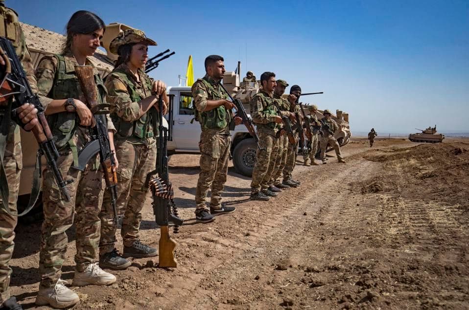 SDF fighters attend a joint military exercise with US-led coalition forces in Hasakah province in September 2022. AFP file photo