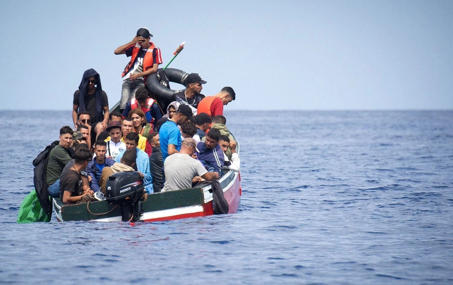 A boat carrying migrants stranded in the Strait of Gibraltar before rescue by Spanish coast guards. Photo: AFP