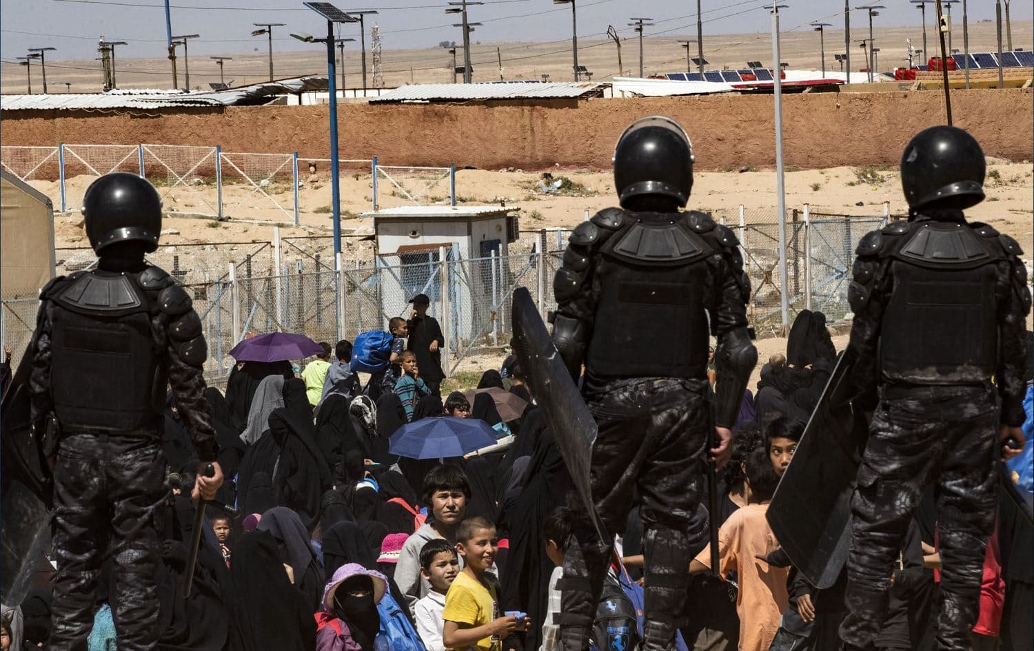 Members of the Kurdish-led Internal Security Forces (Asayish) stand guard at the al-Hol camp in northeast Syria's (Rojava) Hasaka province on April 18, 2025. Photo: AFP