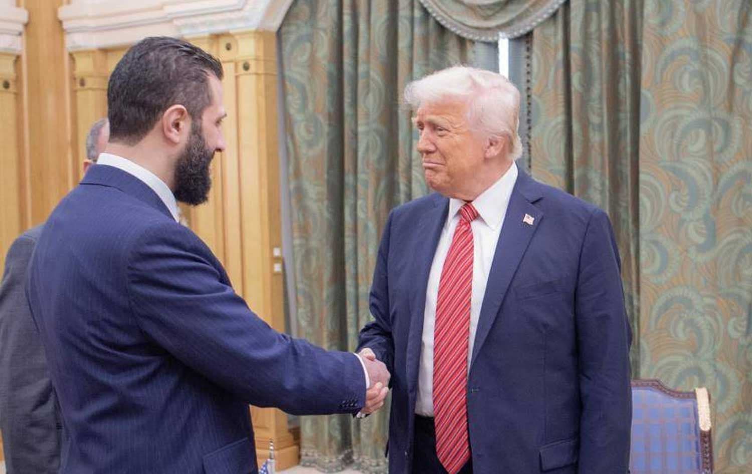 Syria's interim President Ahmed al-Sharaa (left) shakes hands with US President Donald Trump in Riyadh, Saudi Arabia on May 14, 2025. AP file photo