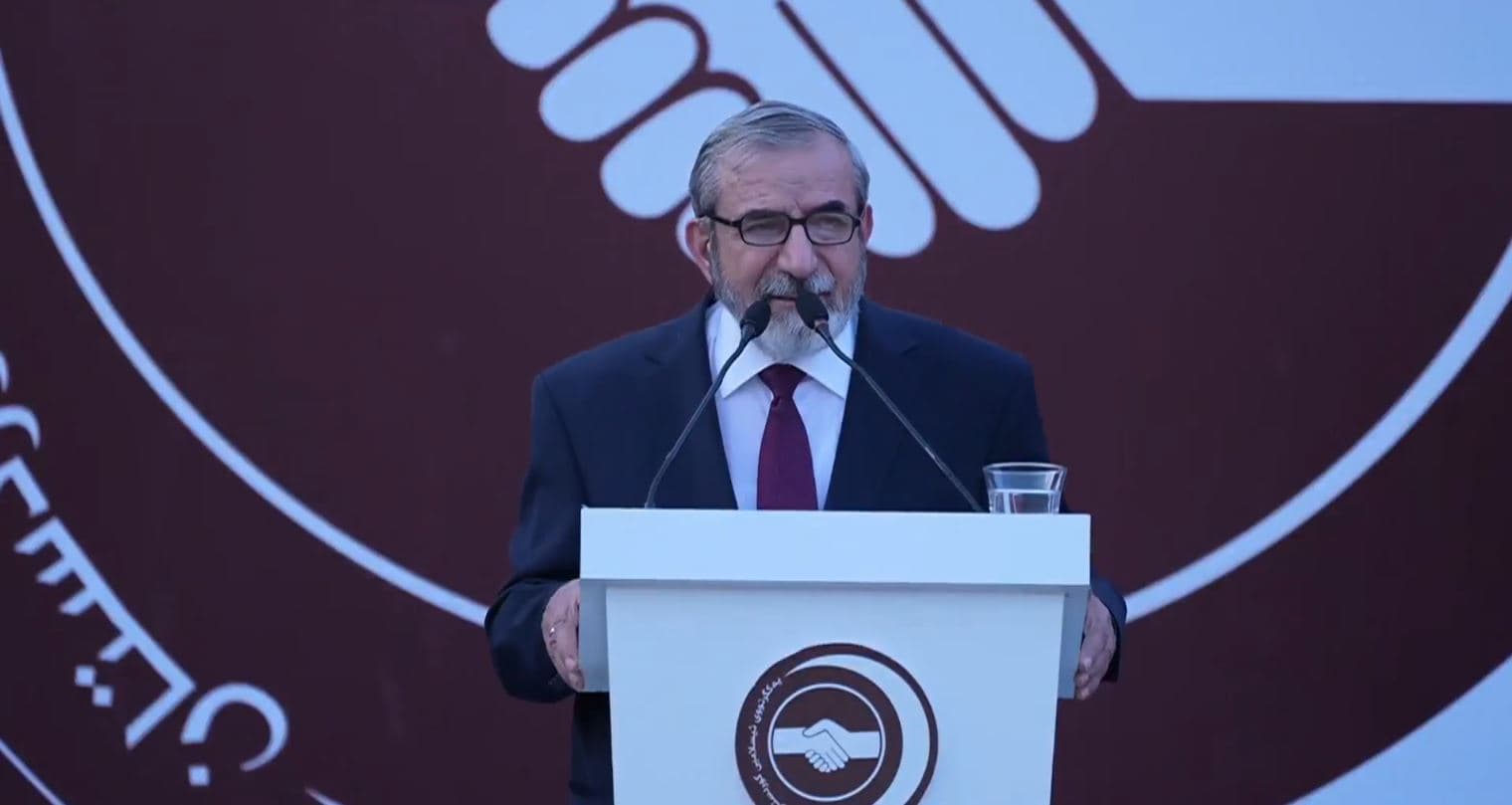 Salahaddin Bahaaddin, secretary-general of the Kurdistan Islamic Union (KIU) addressing his party's supporters at a rally in Erbil on Thursday, November 6, 2025. Photo: KIU media 