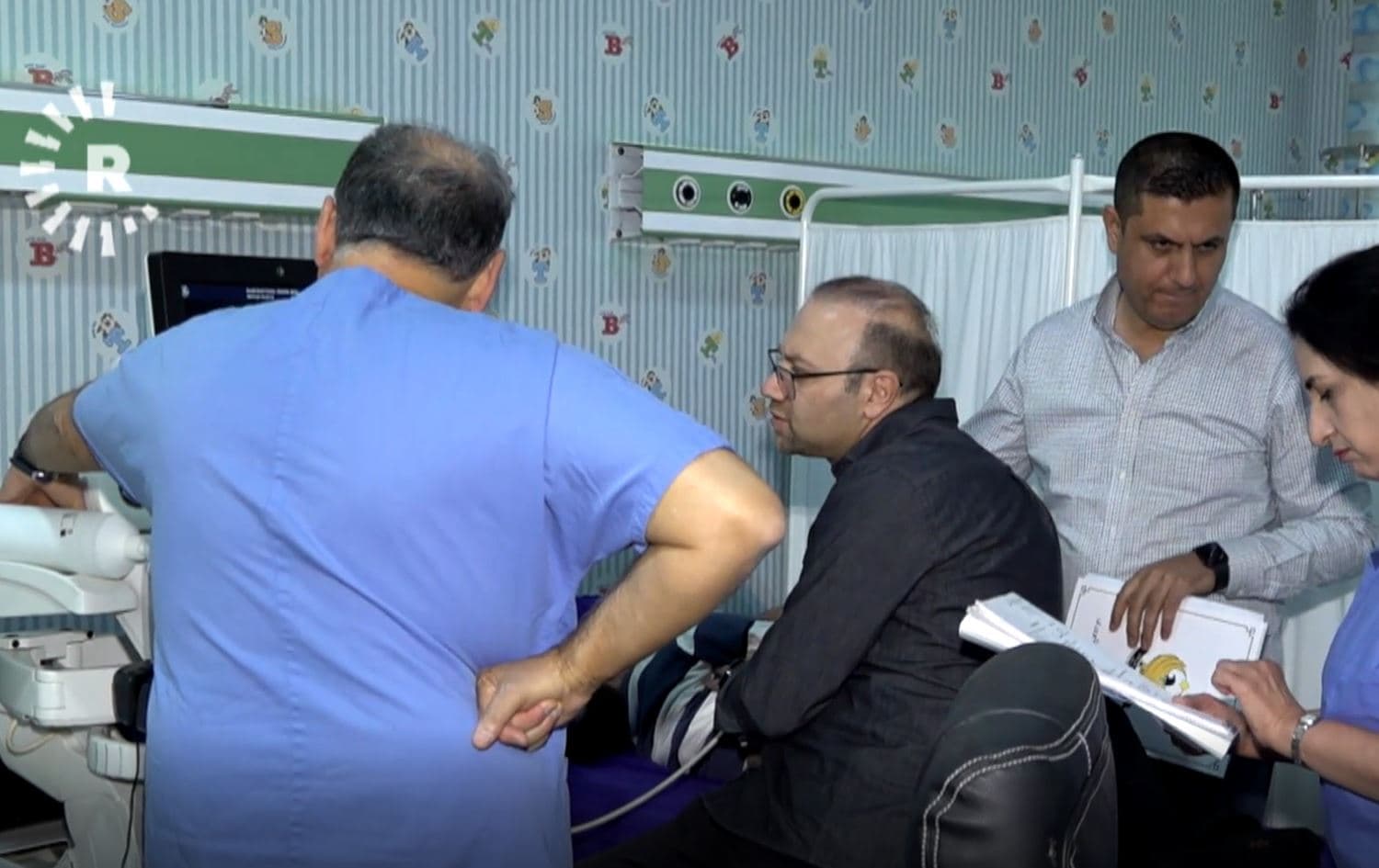 بەشێک لە تیمە پزیشکییەکە لە نەخۆشخانەی منداڵانی دهۆک.