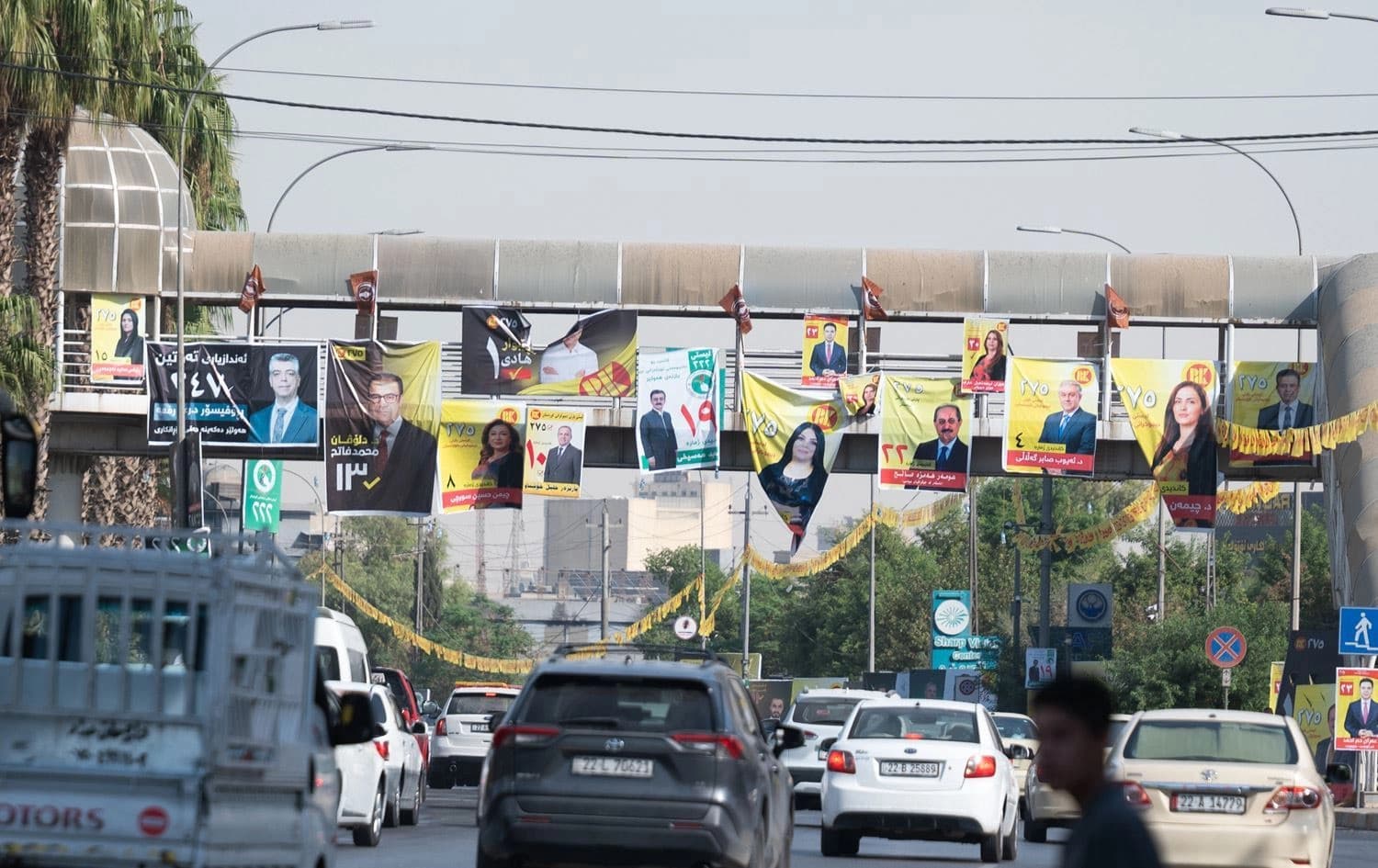 Campaign posters for candidates hang over a busy street in Erbil ahead of Iraq’s 2025 parliamentary elections. Photo: Bilind T. Abdullah / Rudaw