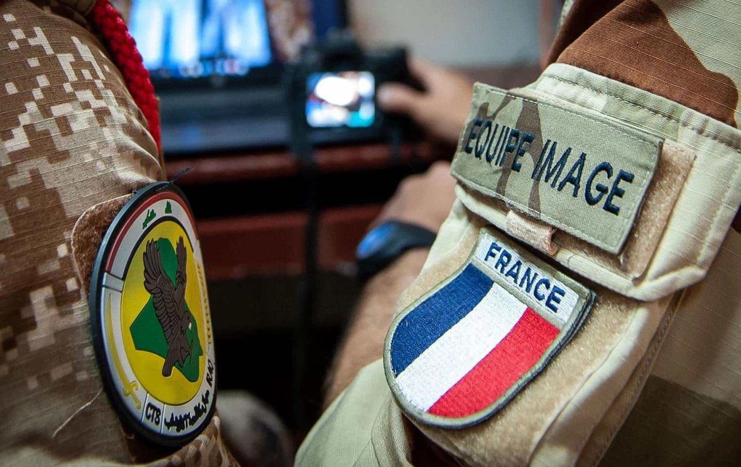 Uniforms bearing the emblems of the Iraqi Counter-Terrorism Service (left) and the imaging team of the French armed forces (right). File photo: Operation Inherent Resolve 
