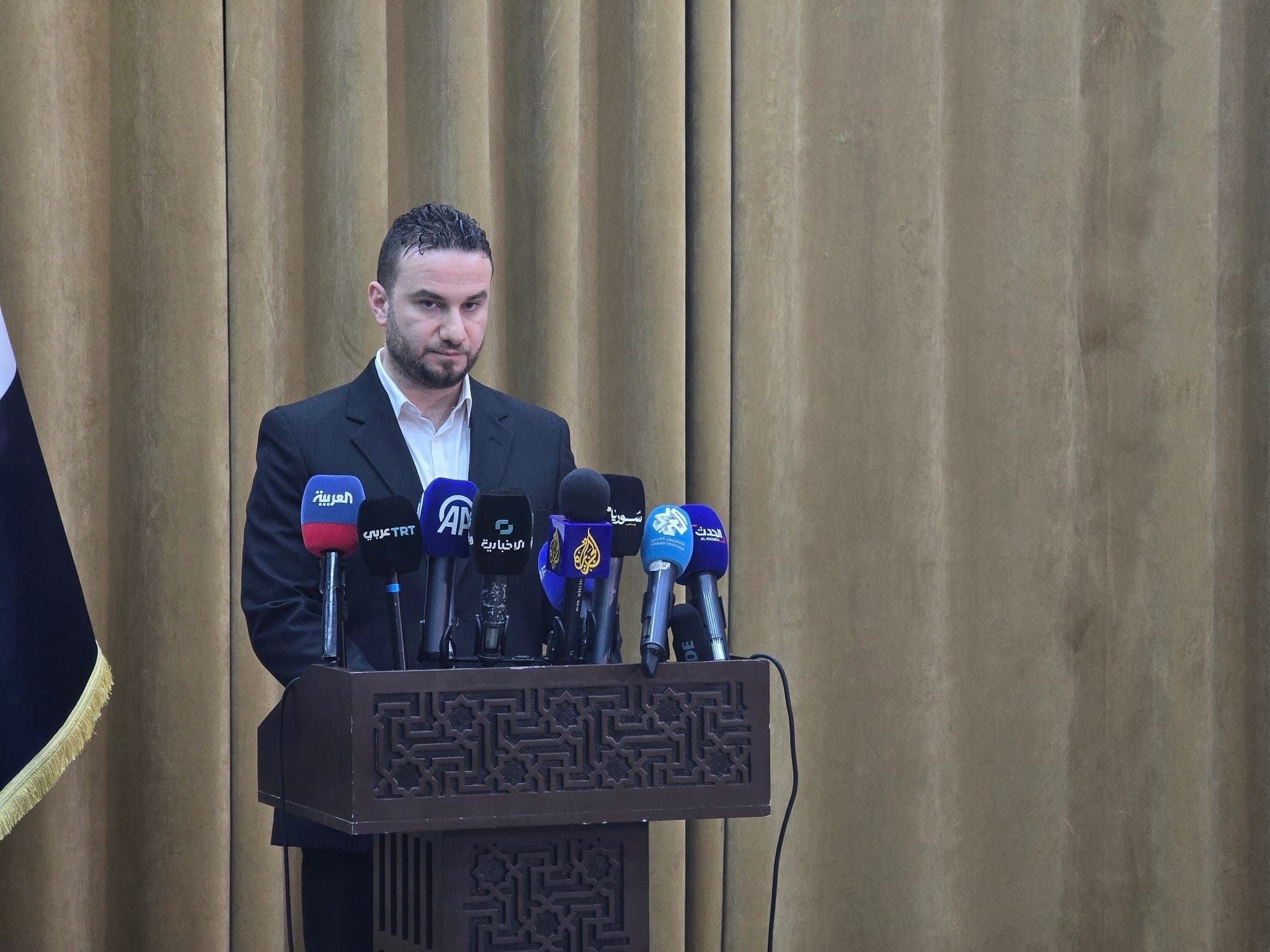 Syrian interior ministry Spokesperson Noureddine al-Baba holds a press conference on June 22, 2025. Photo: SyrianMOISpokes/X