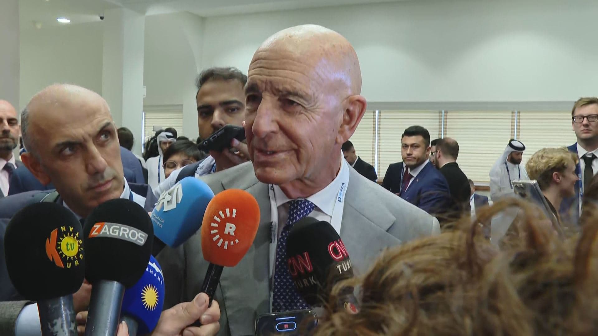 Tom Barrack, US Special Envoy for Syria, speaking to reporters on the sidelines of the Doha Forum on Saturday, December 6, 2025. Photo: Rudaw/screengrab