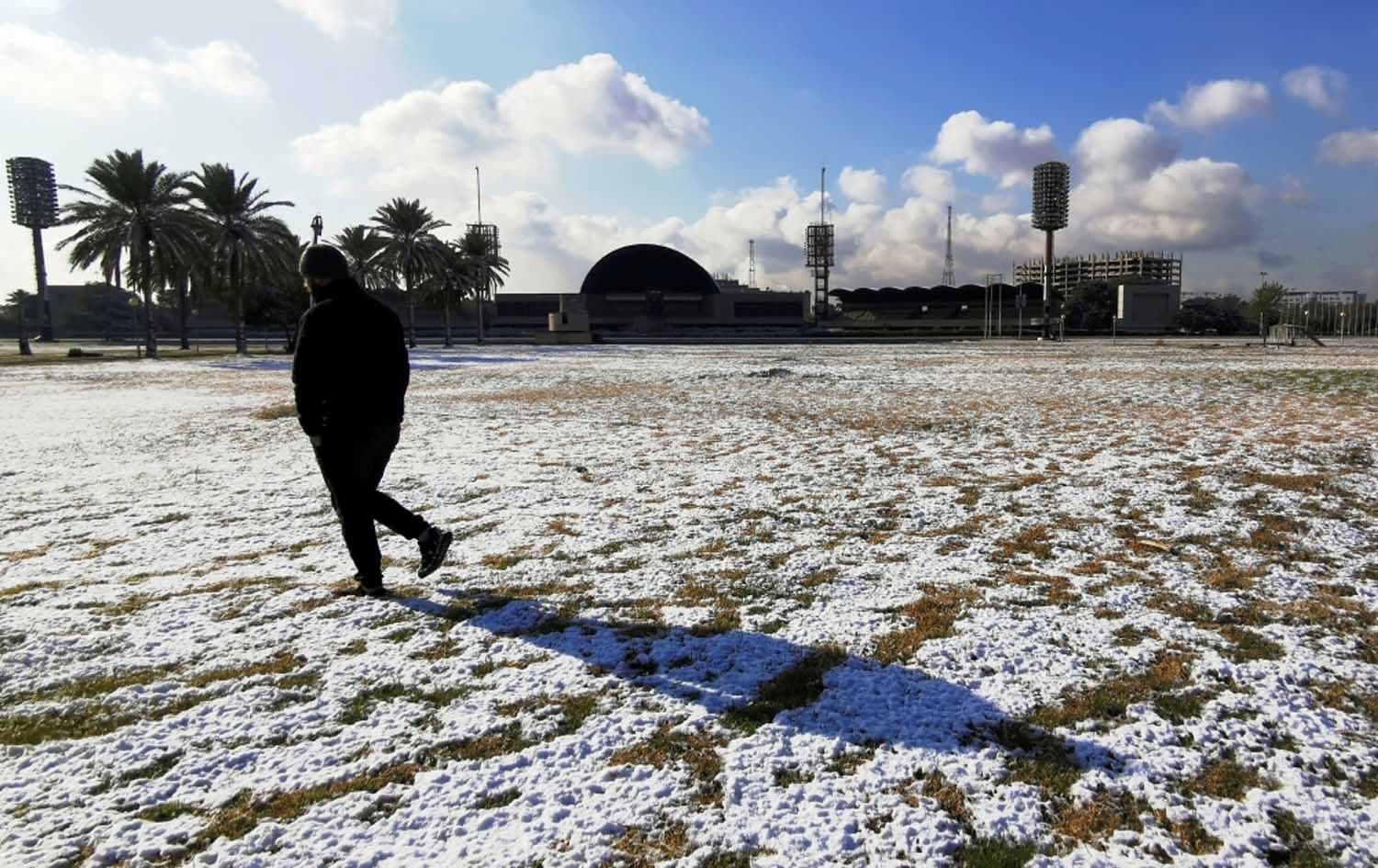 دیمەنی بەفربارینێکی دەگمەن لە بەغدا لە ساڵانی رابردوودا. وێنە: REUTERS