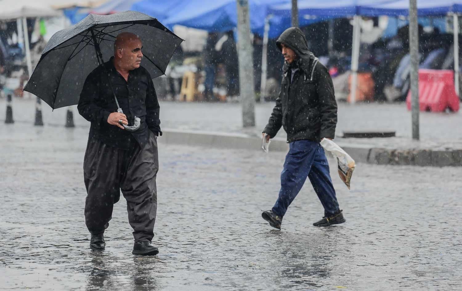 وێنەکە بارانبارینە لە هەولێر و بۆ روونکردنەوەی هەواڵەکەیە؛ وێنە: بڵند تاهیر - رووداو