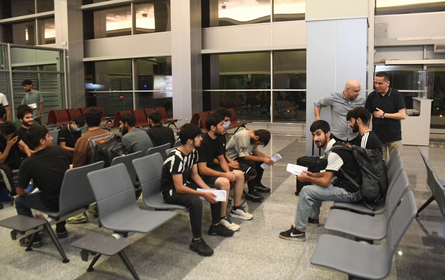 A group of Kurds, after their arrival in Erbil on September 10, 2025, months after being detained in Libya en route to Europe. Photo: KRG