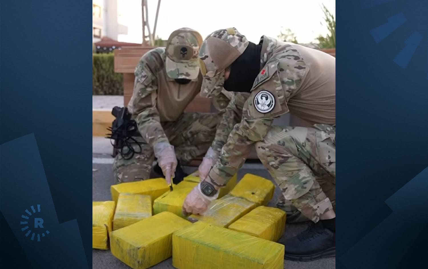 کاتی دەستبەسەرداگرتنی مادە هۆشبەرەکان. وێنەکە لە ڤیدیۆی ئەنجوومەنی ئاسایش وەرگیراوە.