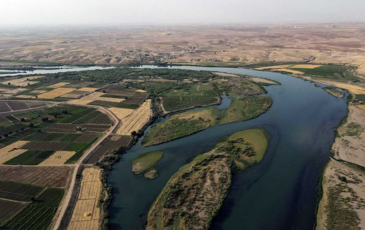 An aerial view of Tigris river, witnessing lower levels of water, in south of Iraq's northern city of Mosul, on June 12, 2022. File photo: AFP 
