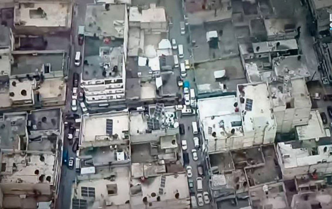 وێنەی گەڕەکی شێخ مەقسوود، کە بە درۆنی سوپای عەرەبیی سووریا تۆمار کراوە. وێنە: سانا