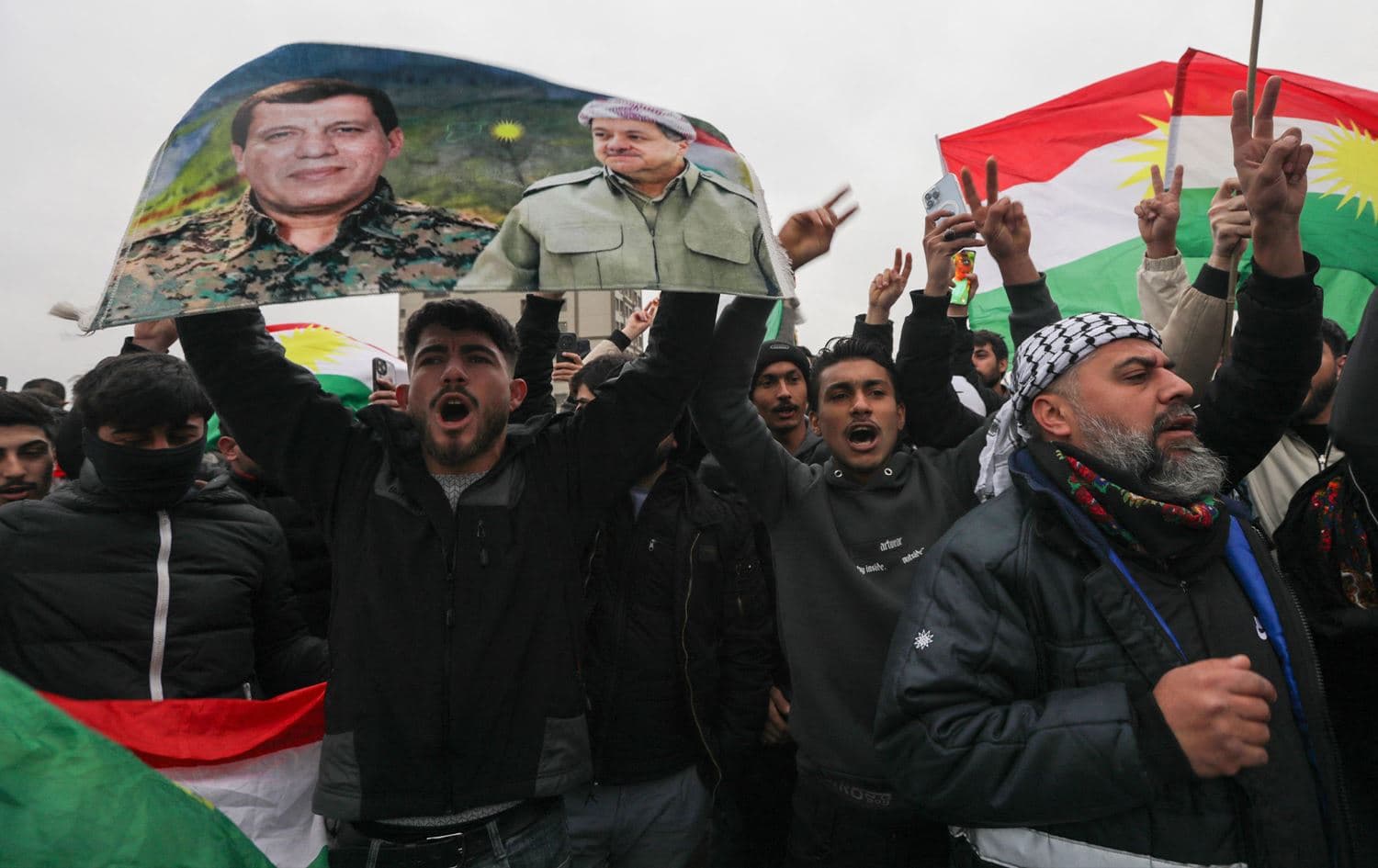 Protests wave the Kurdistan flag during a demonstration in support of the Kurdish-led Syrian Democratic Forces (SDF) as they march in Erbil on January 9, 2026. Photo: Safin Hamid / AFP