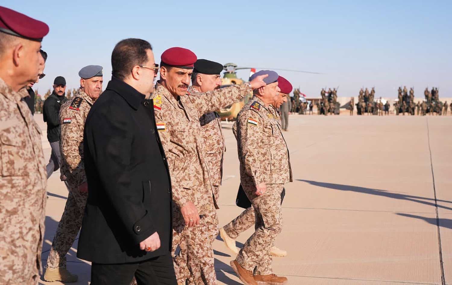 Iraqi Prime Minister Mohammed Shia al-Sudani visits Ain al-Assad airbase in Anbar province alongside senior military commanders on January 21, 2026. Photo: Prime Minister’s Office