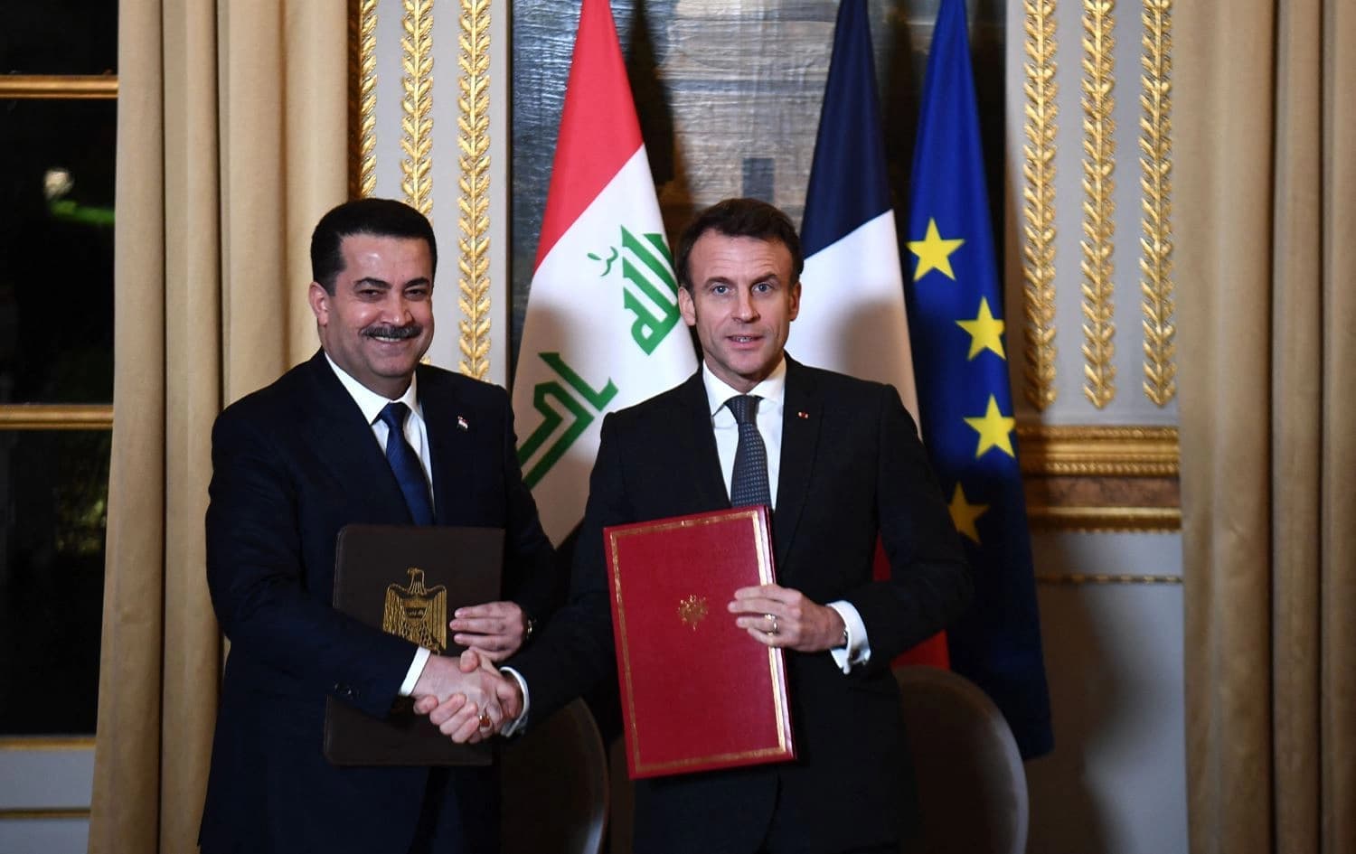 ئیمانوێل ماکرۆن، سەرۆکی فەرەنسا و محەممەد شیاع سوودانی، سەرۆکوەزیرانی عێراق. وێنە: AFP/ئەرشیڤ