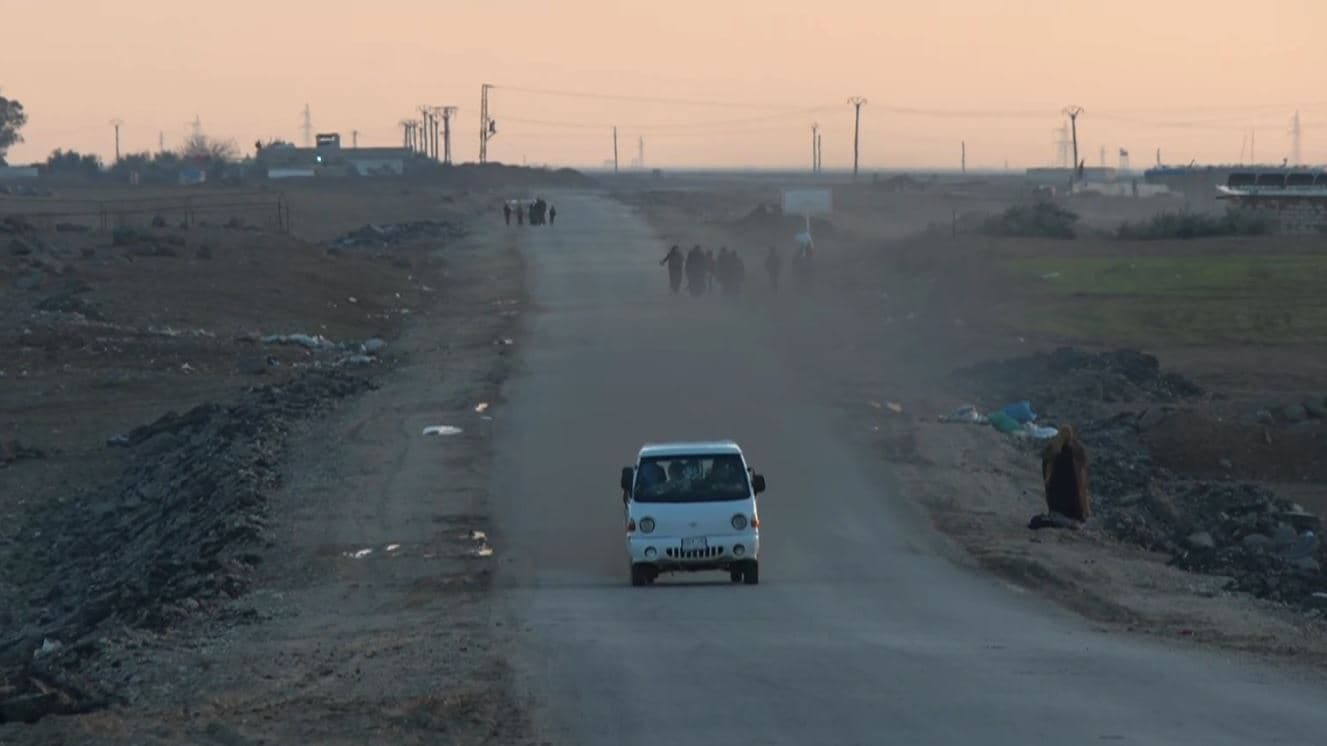 Families flee the violence from the villages of al-Safa and Bakila near Kobane in northern Syria as clashes escalate between Damascus-affiliated armed groups and Kurdish-led forces on January 26, 2026. Photo: Screengrab/Rudaw