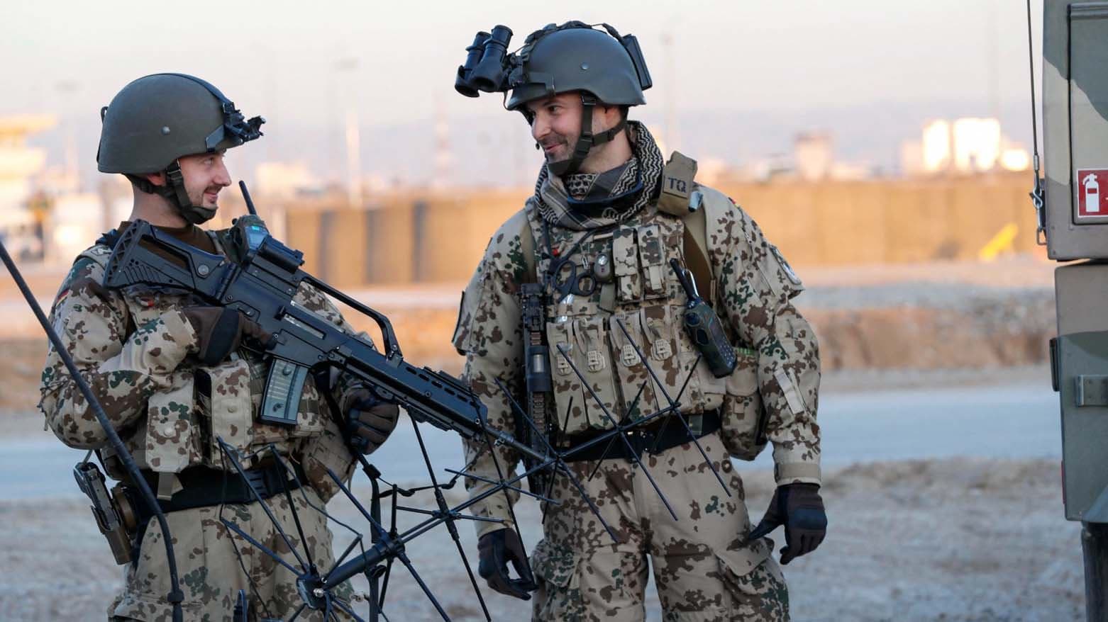 German soldiers stand guard at Erbil International Airport in Kurdistan Region's Erbil. AFP file photo