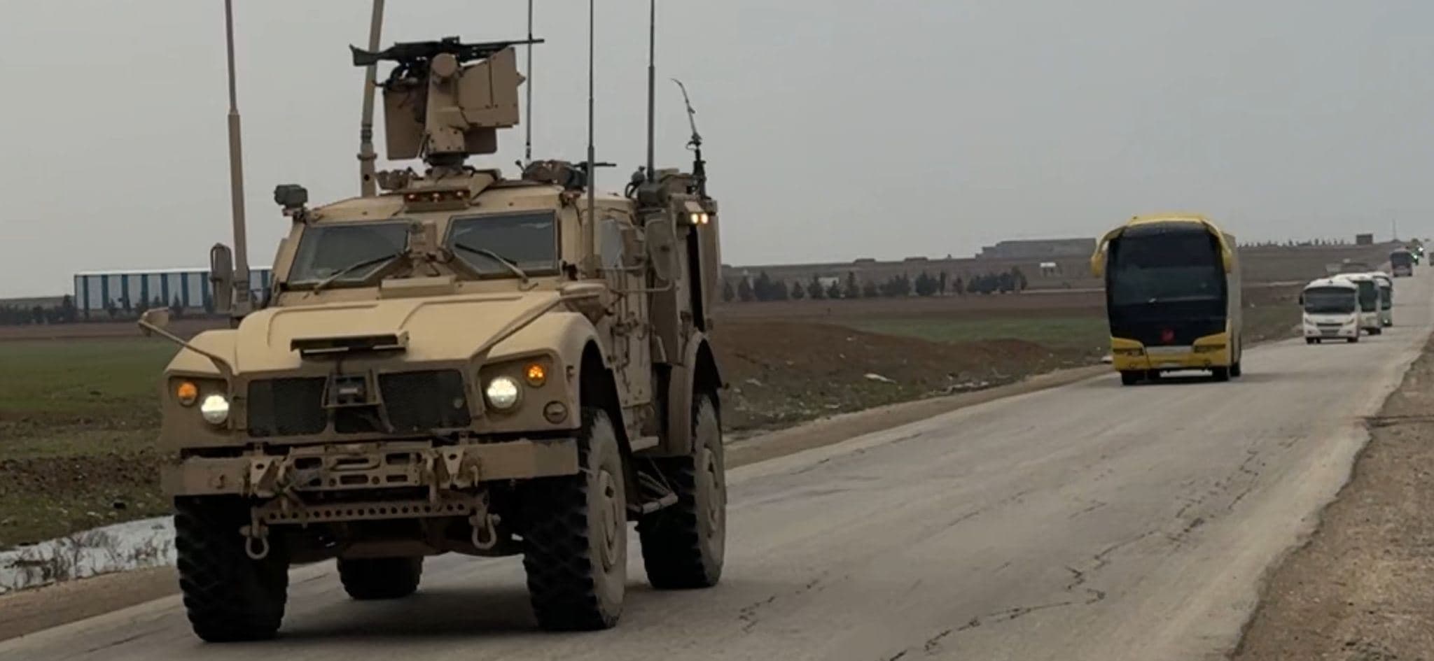 US MRAP vehicles escort five coaches carrying ISIS detainees from Qamishli in northeast Syria (Rojava) toward the Iraqi border. Photo: Fazel Hawramy/Rudaw