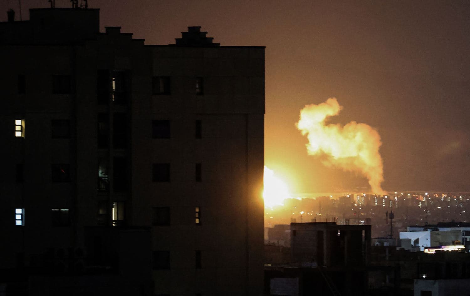 Smoke rises following airstrikes in a central area of Tehran on March 6, 2026. Photo: Atta Kenare / AFP