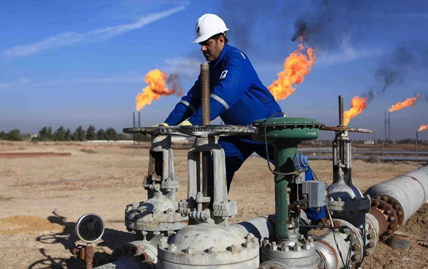 A worker at an oil field in Iraq. File photo: AFP