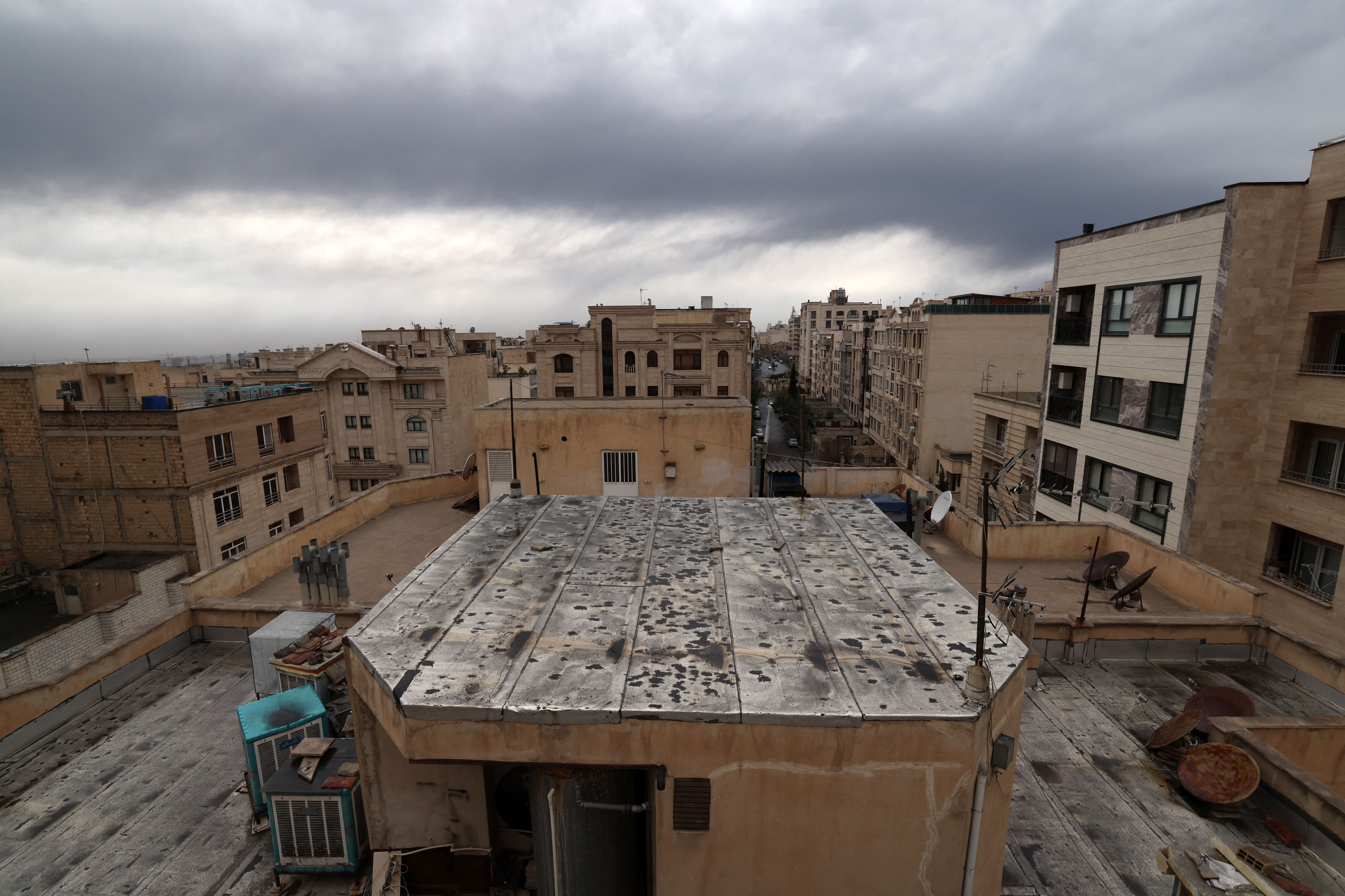 The roof of a house is seen covered with soot after overnight strike on the Tehran Oil Refinery in Tehran on March 8, 2026. Photo: AFP