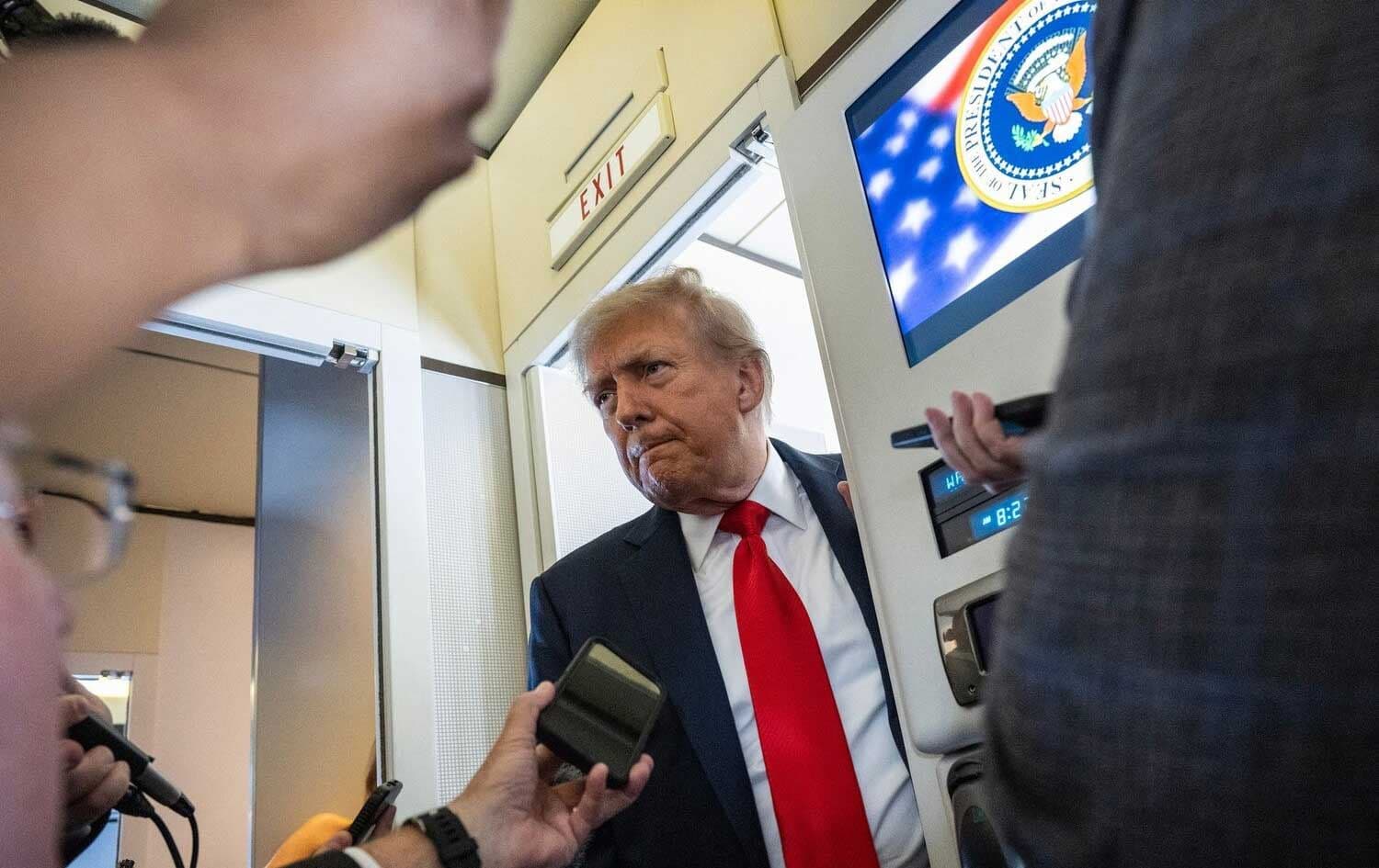 US President Donald Trump speaks to reporters aboard Air Force One on August 15, 2025. Photo: AFP