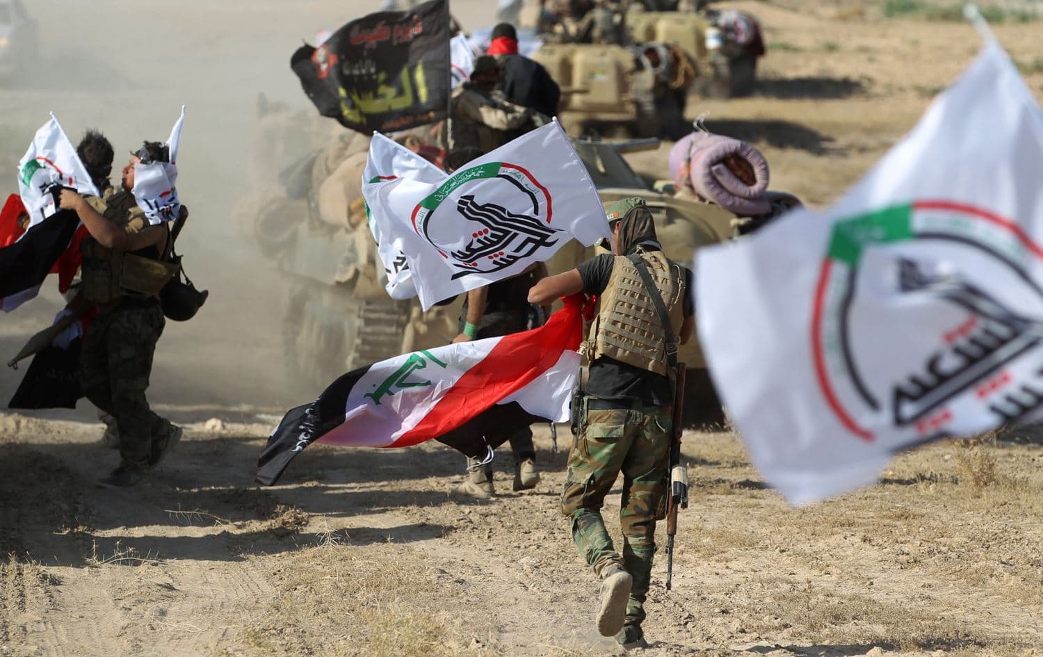 ژمارەیەک چەکداری حەشدی شەعبی. وێنە: Getty Images/ئەرشیڤ