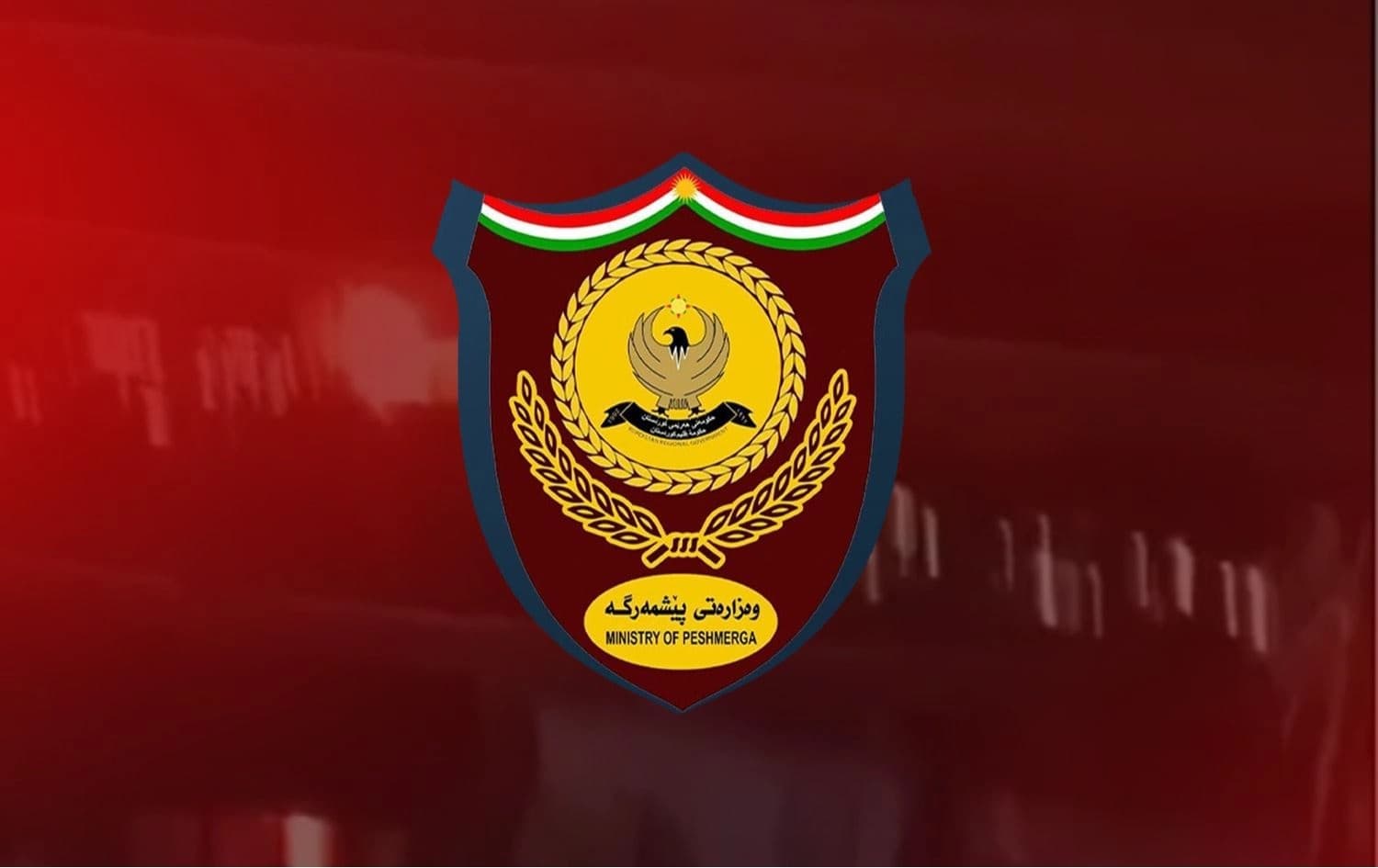 لۆگۆی وەزارەتی پێشمەرگە و باگراوەند دیمەنی رووداوەکە