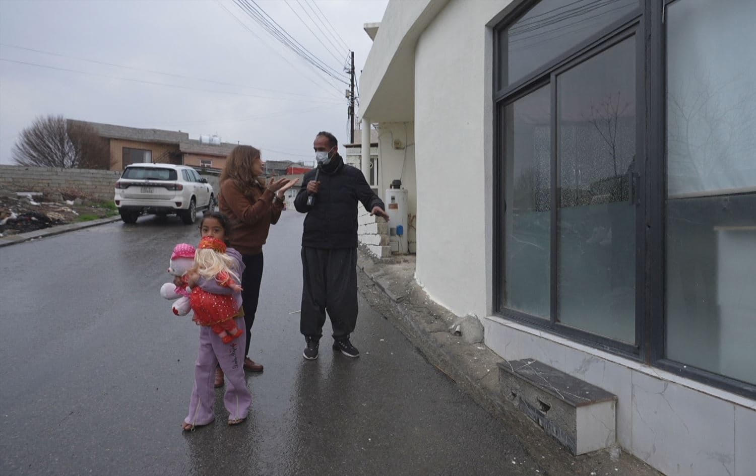 A family receiving a home in the Kurdistan Region as a part of Rudaw’s Ramadan Berpirsyar program in 2026. Photo: Screengrab / Rudaw